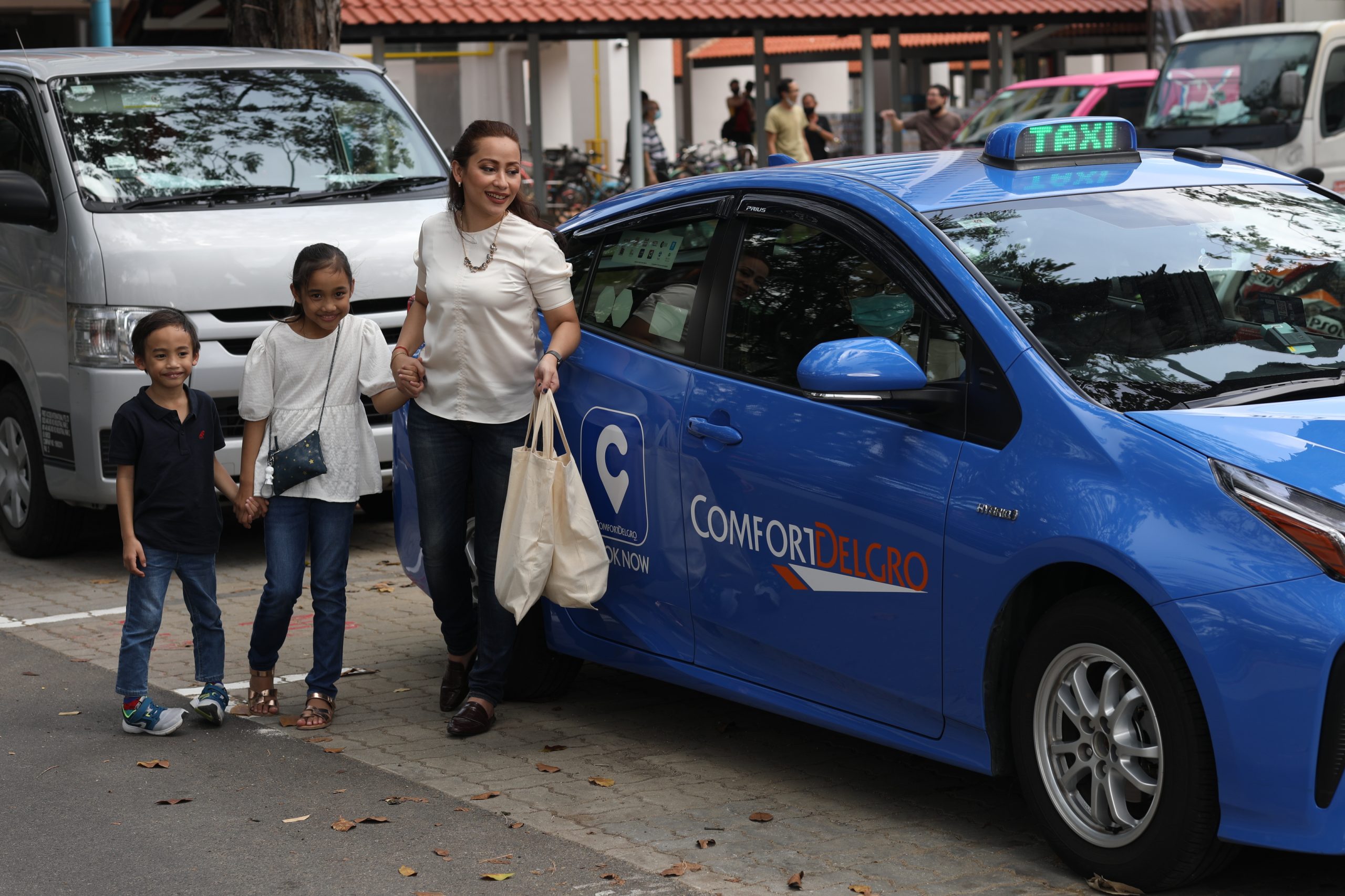 How does ComfortDelGro Taxi increase business for our taxi drivers?